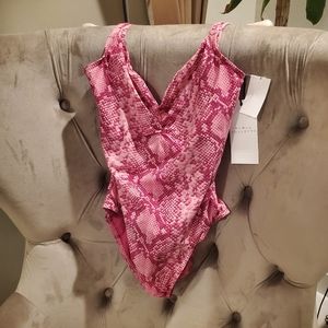 Karla Colletto pink snake pattern size 10 NWT. 72 %nylon 28% Xtra life lycra